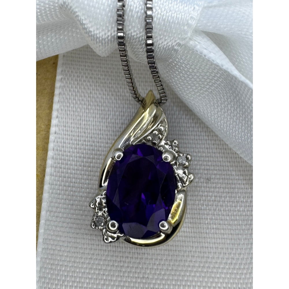 Amethyst with diamond necklace set in 10k and Sterling silver